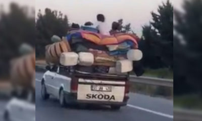 Kamyonet üzerinde tehlikeli yolculuk