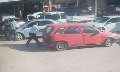 Satıp parasını alamadığı otomobilini tamirhaneden iterek götürdü