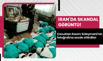 İran’da sapkınlık pes dedirtti! Çocukları General Süleymani’nin fotoğrafına secde ettirdiler!.