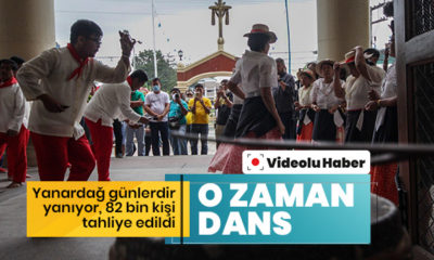 Filipinler’de günlerdir yanan yanardağı söndürmek için dans ediyorlar!. (video haber)