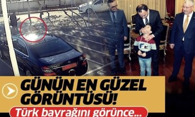 İlkokul öğrencisi, valinin makam aracında ki bayrağı öptü!. (video haber)
