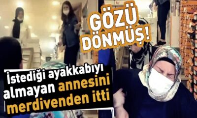 İstediği ayakkabıyı almayan annesini merdivenden itti!. (video haber)