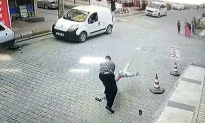 10 yaşında ki çocuğu sokak ortasında öldüresiye dövdü!. (video haber)