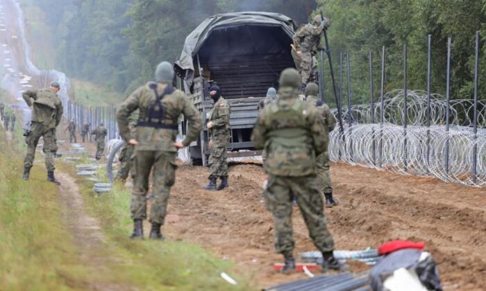 Polonya göçmenlere karşı Belarus sınırına duvar örecek!.