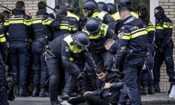 Hollanda’da polise saldıran 12 PKK yandaşı gözaltına alındı!.