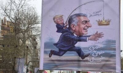 Trump yalakası Pehlevi’ye İran halkından pankartlı cevap!.